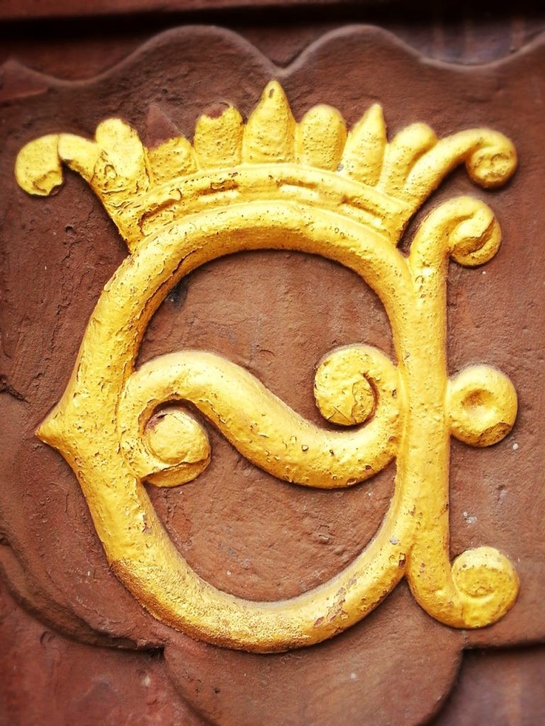 Vergoldetes Emblem